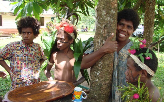 Visiting Epule Village is a delightful experience - they want to sell us their hand carved wooden bowl, and they do! © BW Media